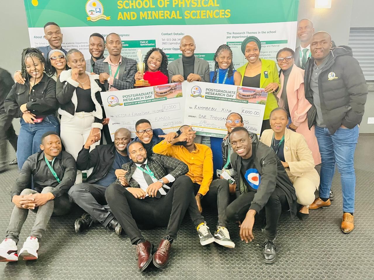 Group members celebrating awards
